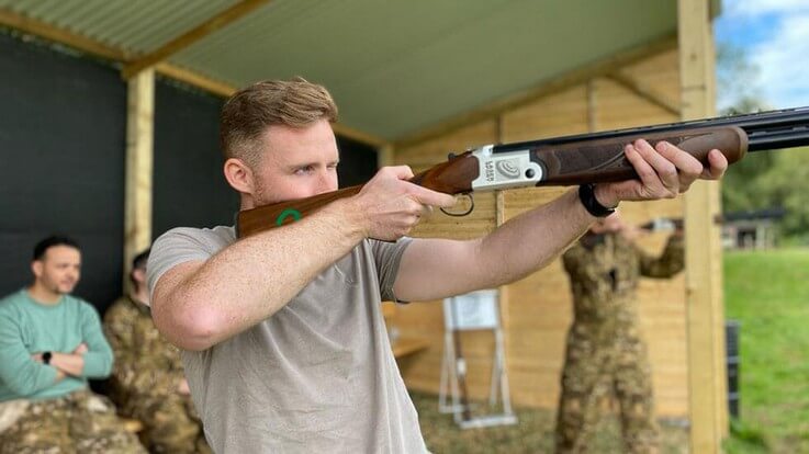 aiming down barrel at clays