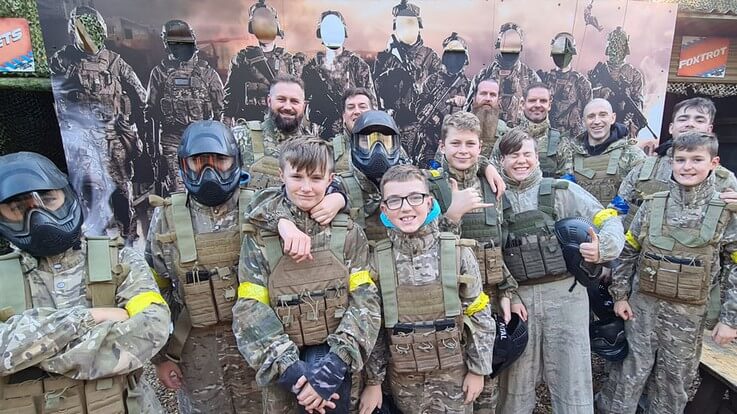family group in airsoft gear