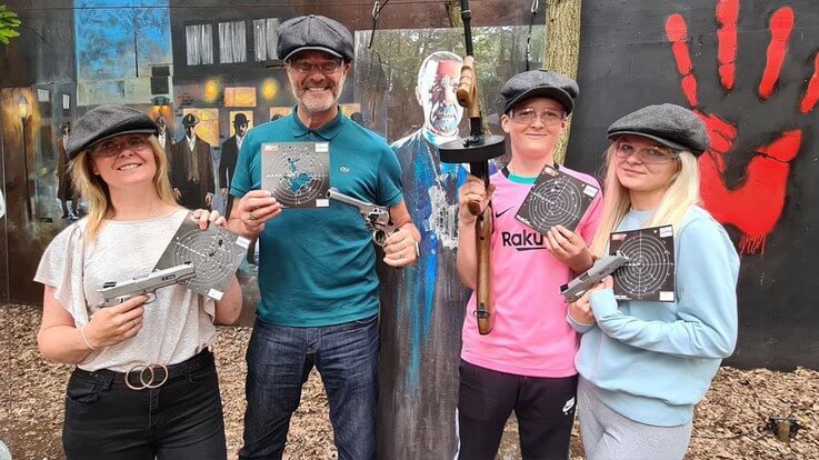 family group on pistol range