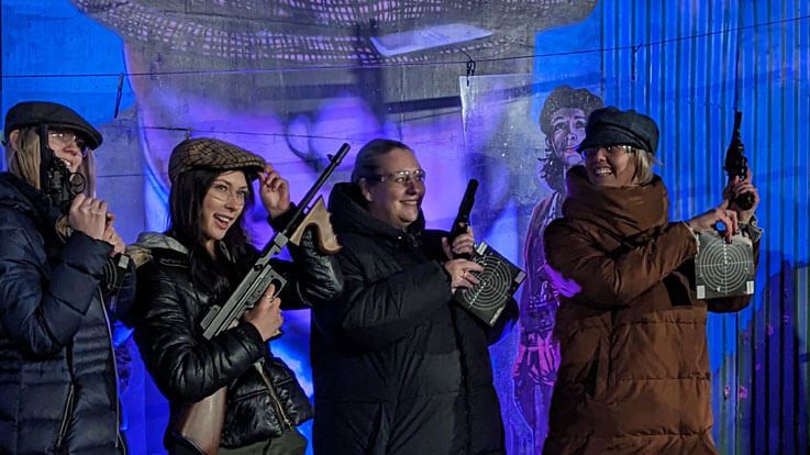 hen party ladies holding guns and targets