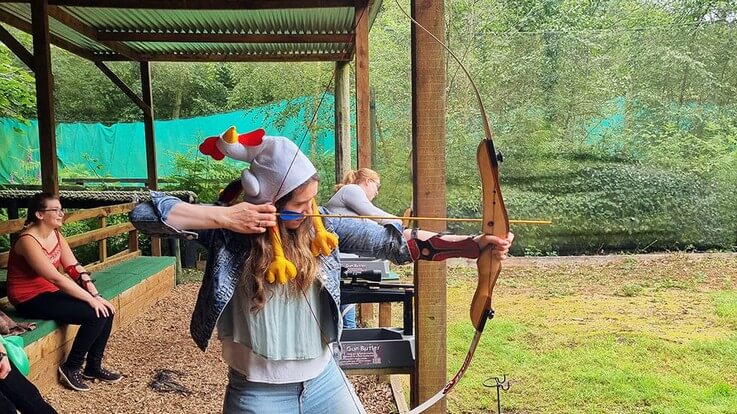 lady archer taking aim
