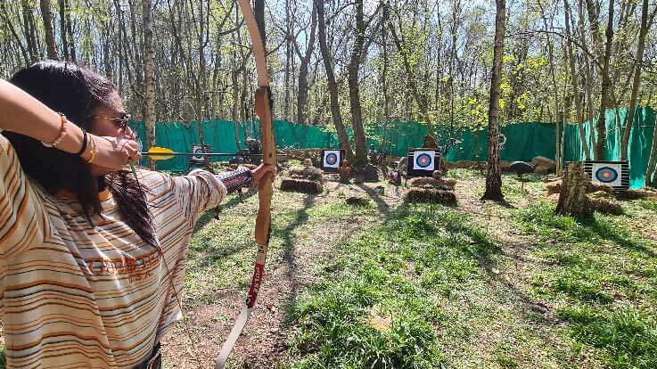 lady archery drawing bow