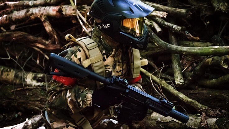 player with full rental airsoft gear