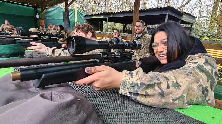 shooting party aiming down range