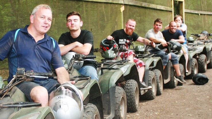 stag party sitting on quad bikes