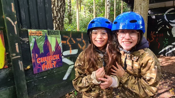 two happy kids in jungle escape