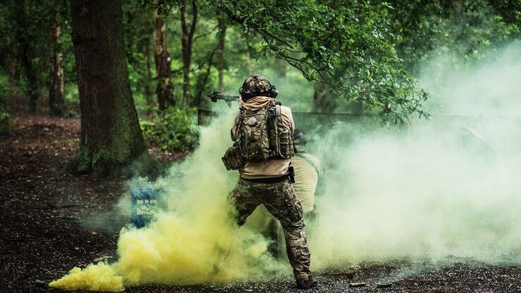 two players using smoke as cover