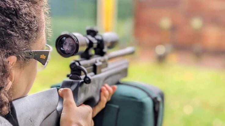 view over shoulder of rifle shooting