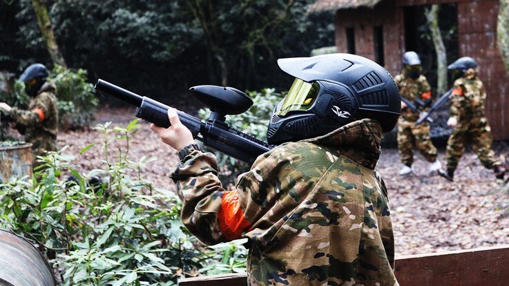 young player taking aim