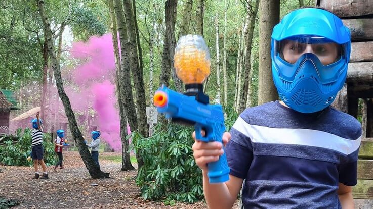 young player with gelball gun